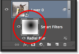 The layer preview thumbnail showing the Smart Object icon. Image © 2013 Photoshop Essentials.com