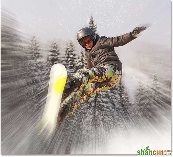 The snowboarder is now visible through the zoom effect. Image © 2013 Photoshop Essentials.com