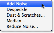 Selec<em></em>ting the Add Noise filter from the Filter menu. Image © 2013 Photoshop Essentials.com