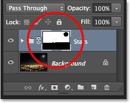 Selecting the Use Previous Layer to Create Clipping Mask option in the New Layer dialog box. Image © 2013 Photoshop Essentials.com