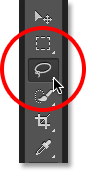 Selecting the Lasso Tool in Photoshop. Image © 2013 Photoshop Essentials.com