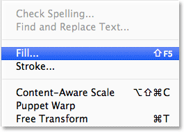 Selec<em></em>ting the Fill command from the Edit menu in the Menu Bar. Image © 2013 Photoshop Essentials.com